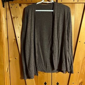 Light brown sweater/ cardigan.